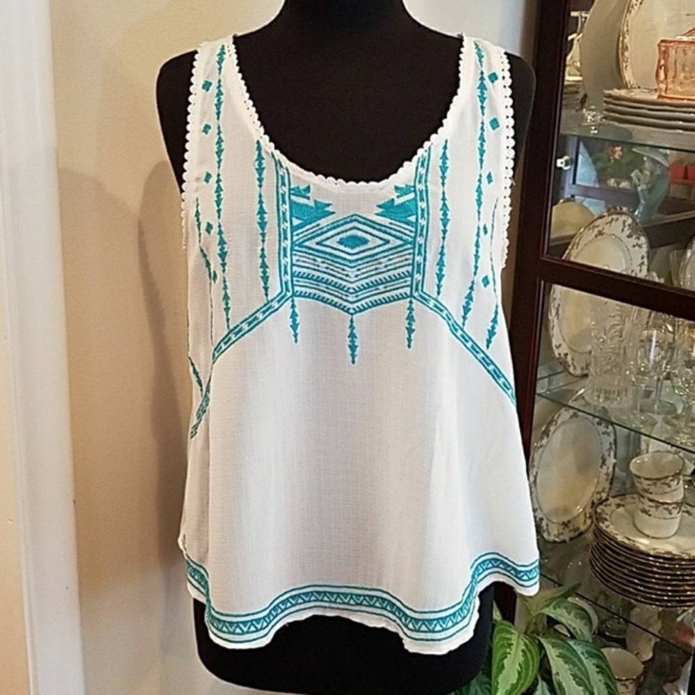 Sheer white tank top with teal tribal stitching